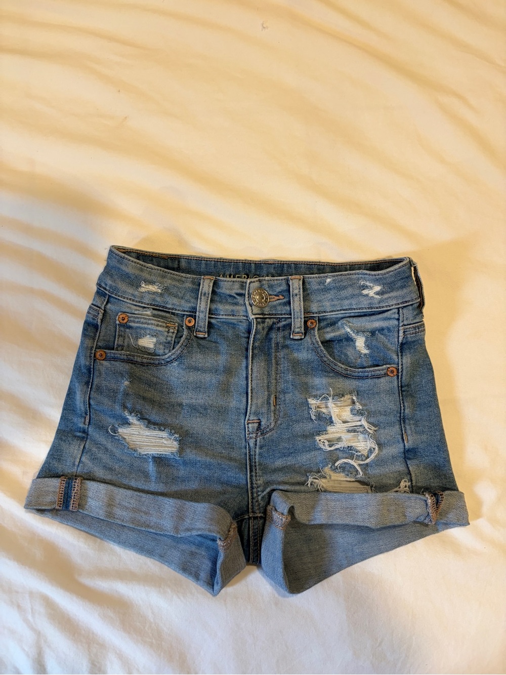 American Eagle Outfitters Distressed Rolled-Hem Denim Shorts - Blue Size 00